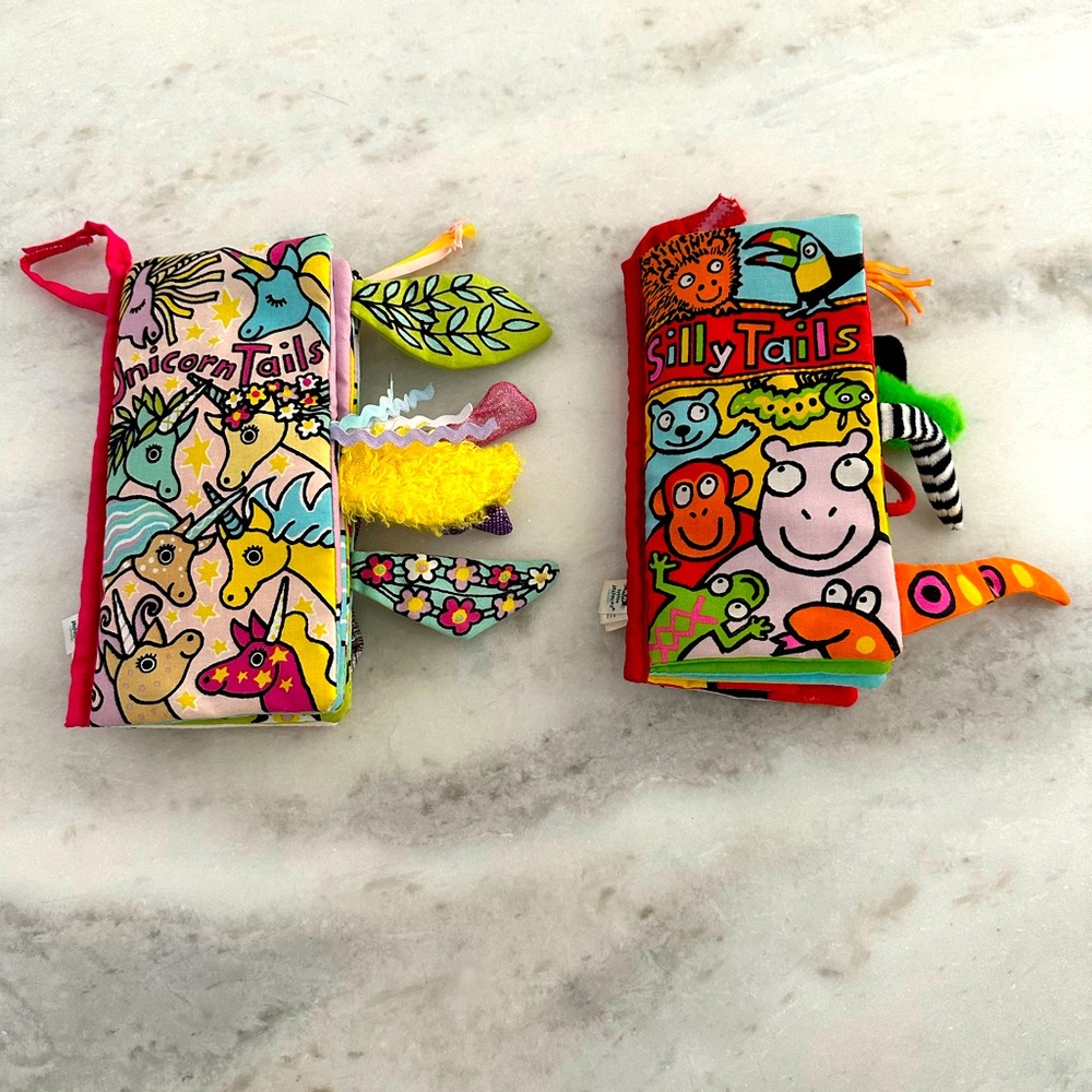 Bundle of two jellycat baby activity books. Unicorn tails and silly tails